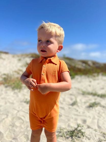 Drift Polo Romper - Tangerine Pique
